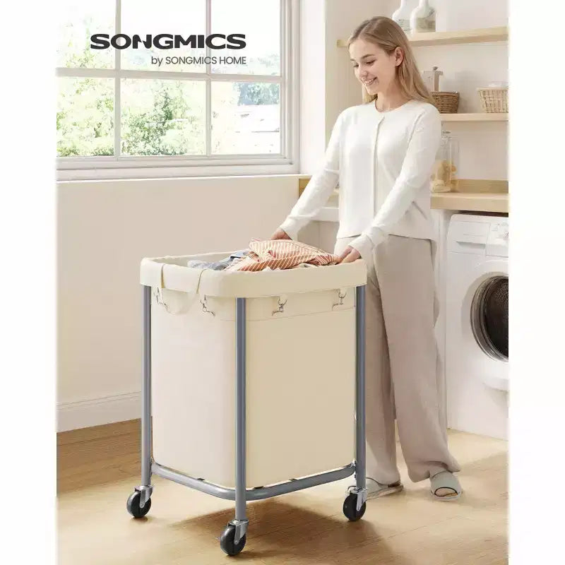 Panier à linge de 170 L (45 gallons) avec roulettes, avec cadre en acier et sac amovible, 2 roulettes verrouillables, blanc cassé et argent métallique